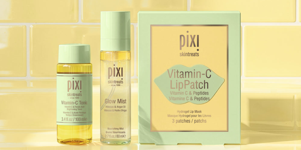 Featuring Vitamin-C Tonic Travel Size, Glow Mist, and Vitamin-C LipPatches (set of 3) on a yellow tiled background - view 2