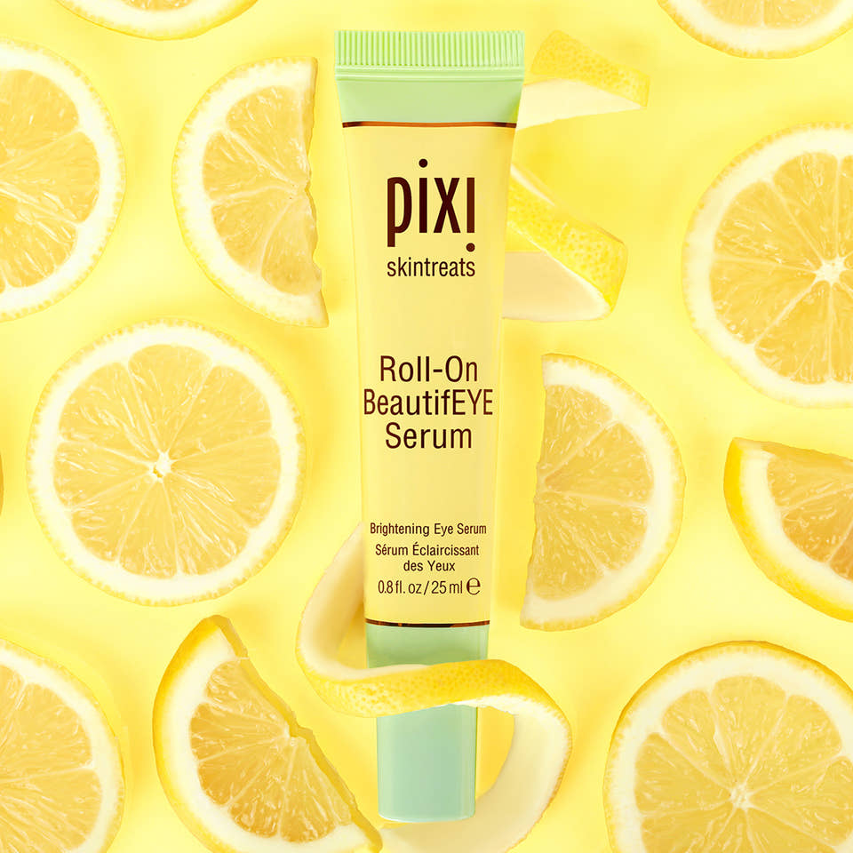 Pixi Roll-On BeautifEYE Serum with lemon slices on a yellow background view 2